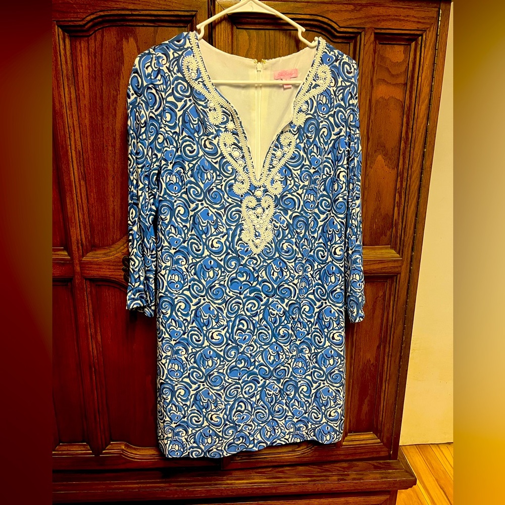 Lilly Pulitzer size small v neck dress with bead embellishment.